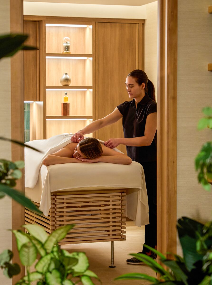 A woman enjoys a massage at the Fairmont Chateau Lake Louise, a popular thing to do in August in Banff National Park.