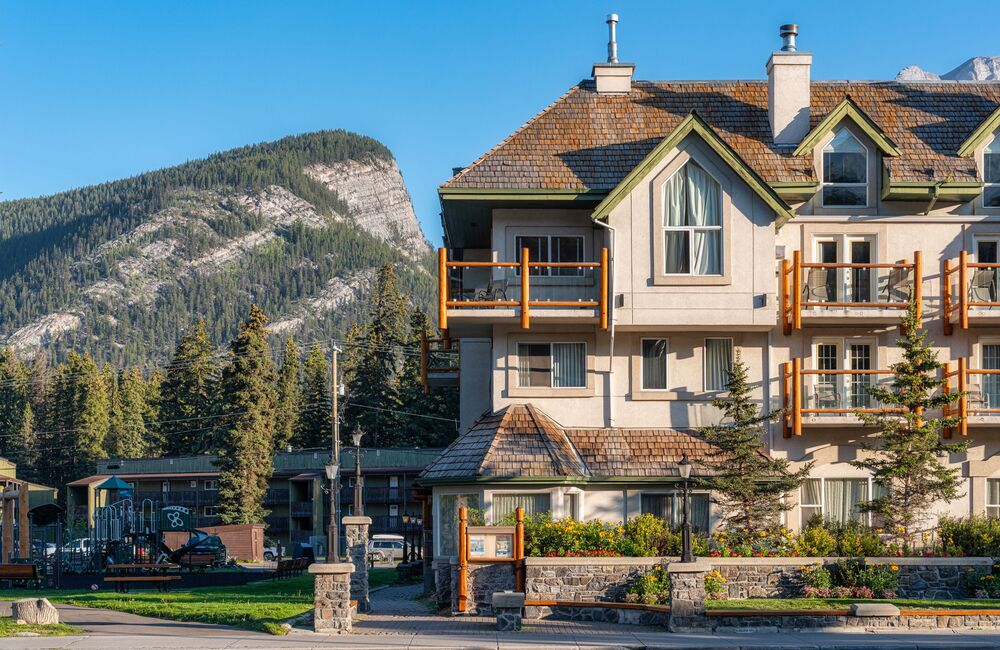 Summer in Banff at The Rundlestone Lodge with a mountain backdrop