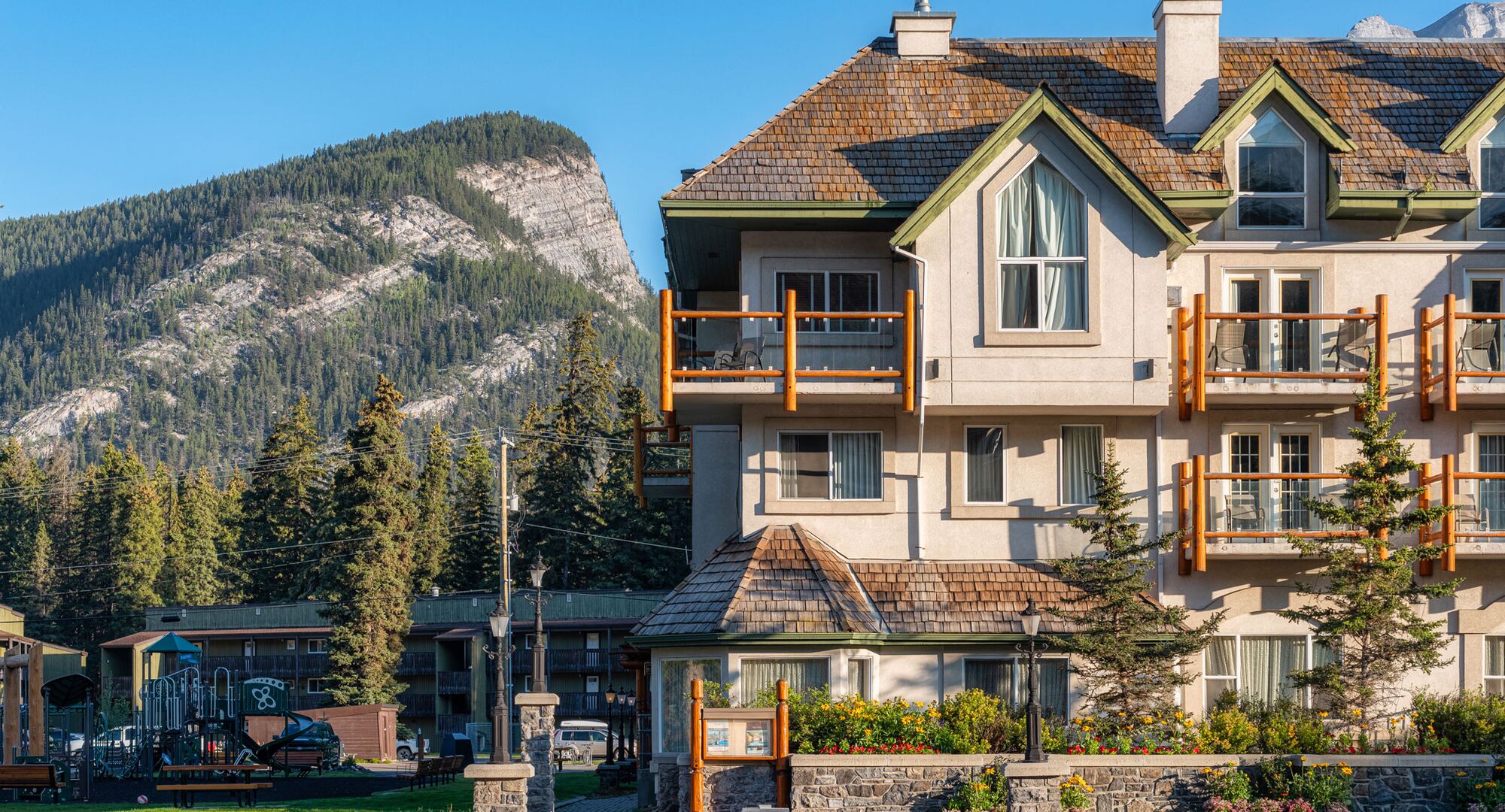 Summer in Banff at The Rundlestone Lodge with a mountain backdrop