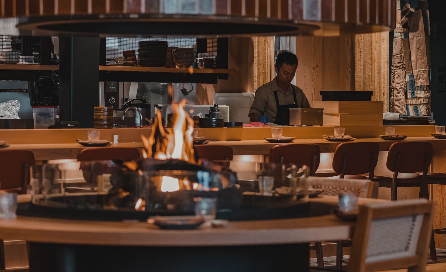 The interior of a restaurant with a fire place in Banff National Park