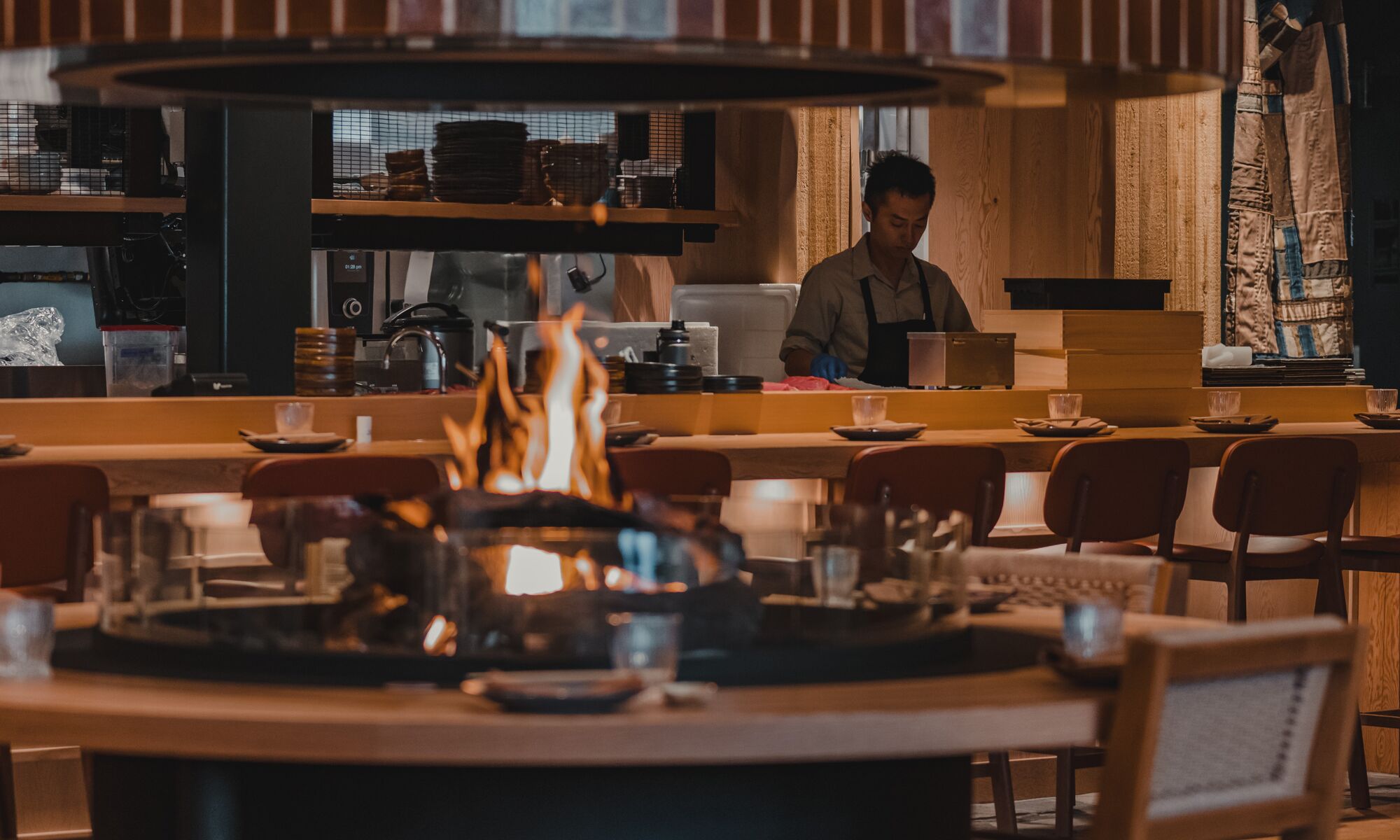 The interior of a restaurant with a fire place in Banff National Park