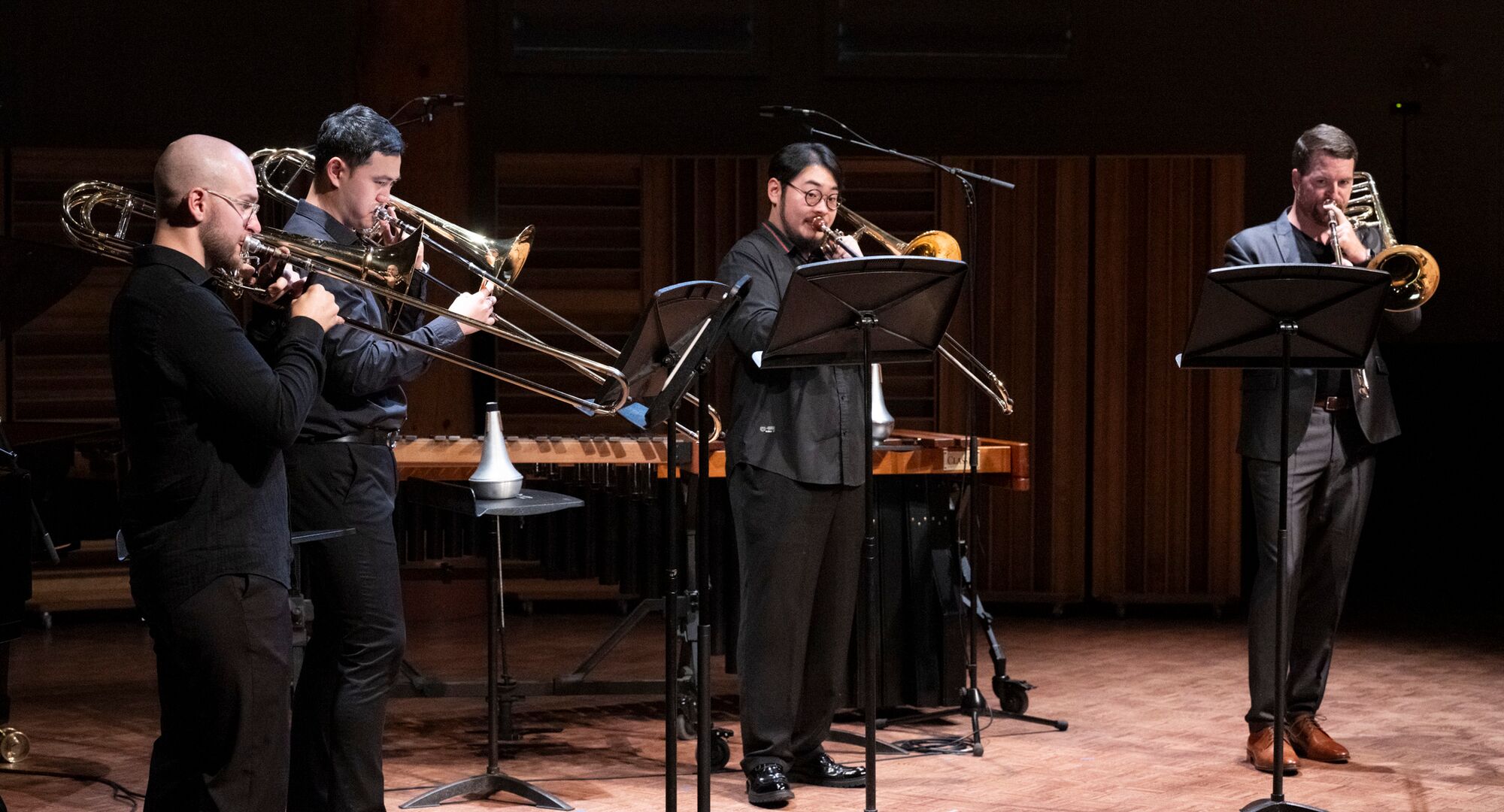 Interplay Chamber Music Concert, 2024. L to R: Lee Allen (alto trombone), Jihong Son (tenor trombone), Charlie Cao (tenor trombone), and  DJ Combs (bass trombone).
