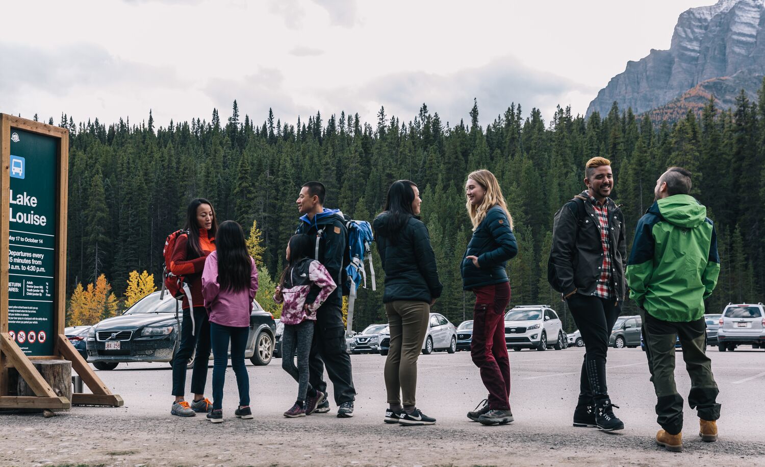 People waiting in line for a shuttle bus to Moraine Lake in Banff National Park
