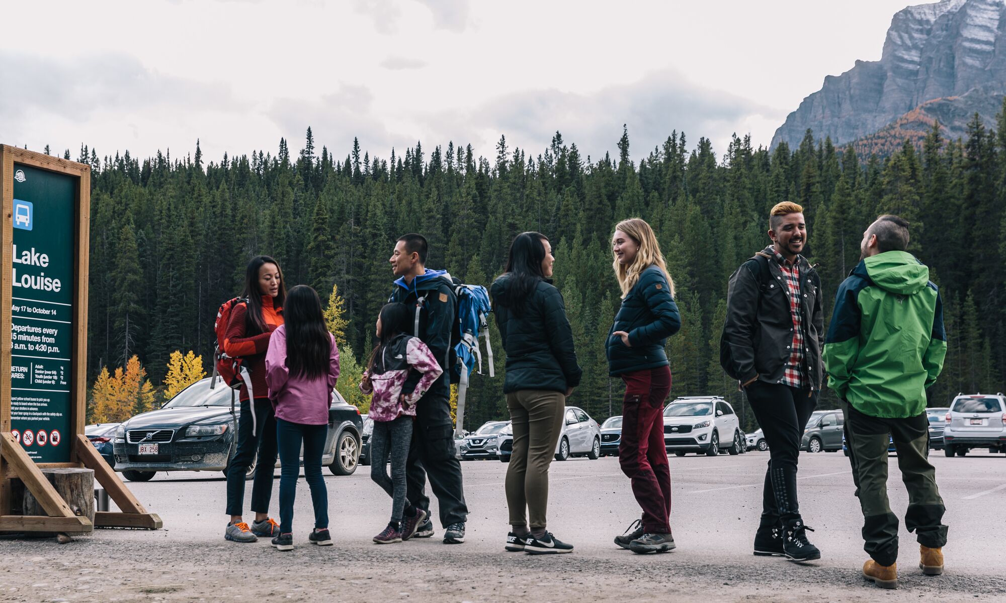 People waiting in line for a shuttle bus to Moraine Lake in Banff National Park
