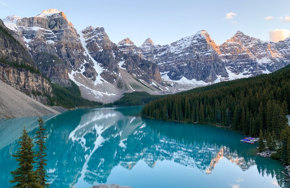 The view of Moraine Lake at sunset in Banff National Park from the Rockpile Trail, one of the best hikes in Moraine Lake.