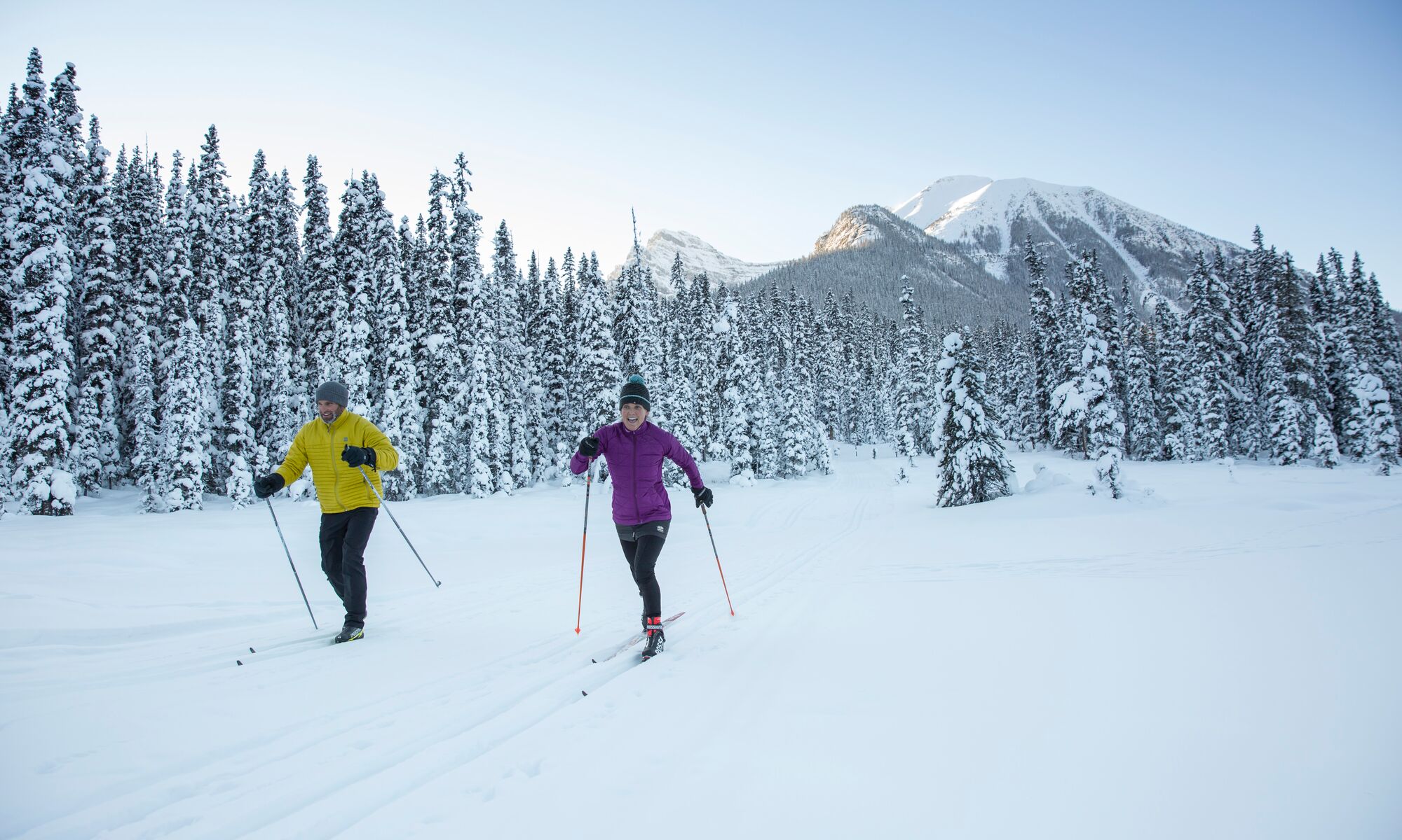 Two people cross country skiing in Lake Louise in Banff National Park