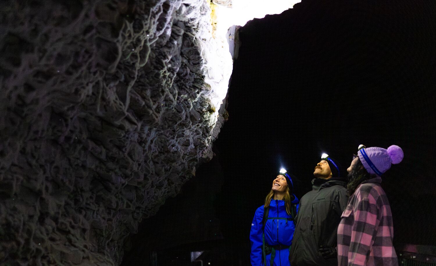A group of people on an evening ice walk in Banff National Park