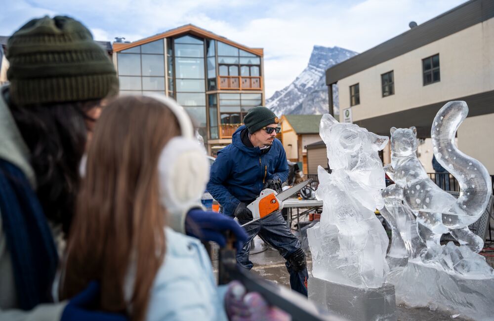 Two professional ice carvers during SnowDays in Banff and Lake Louise
