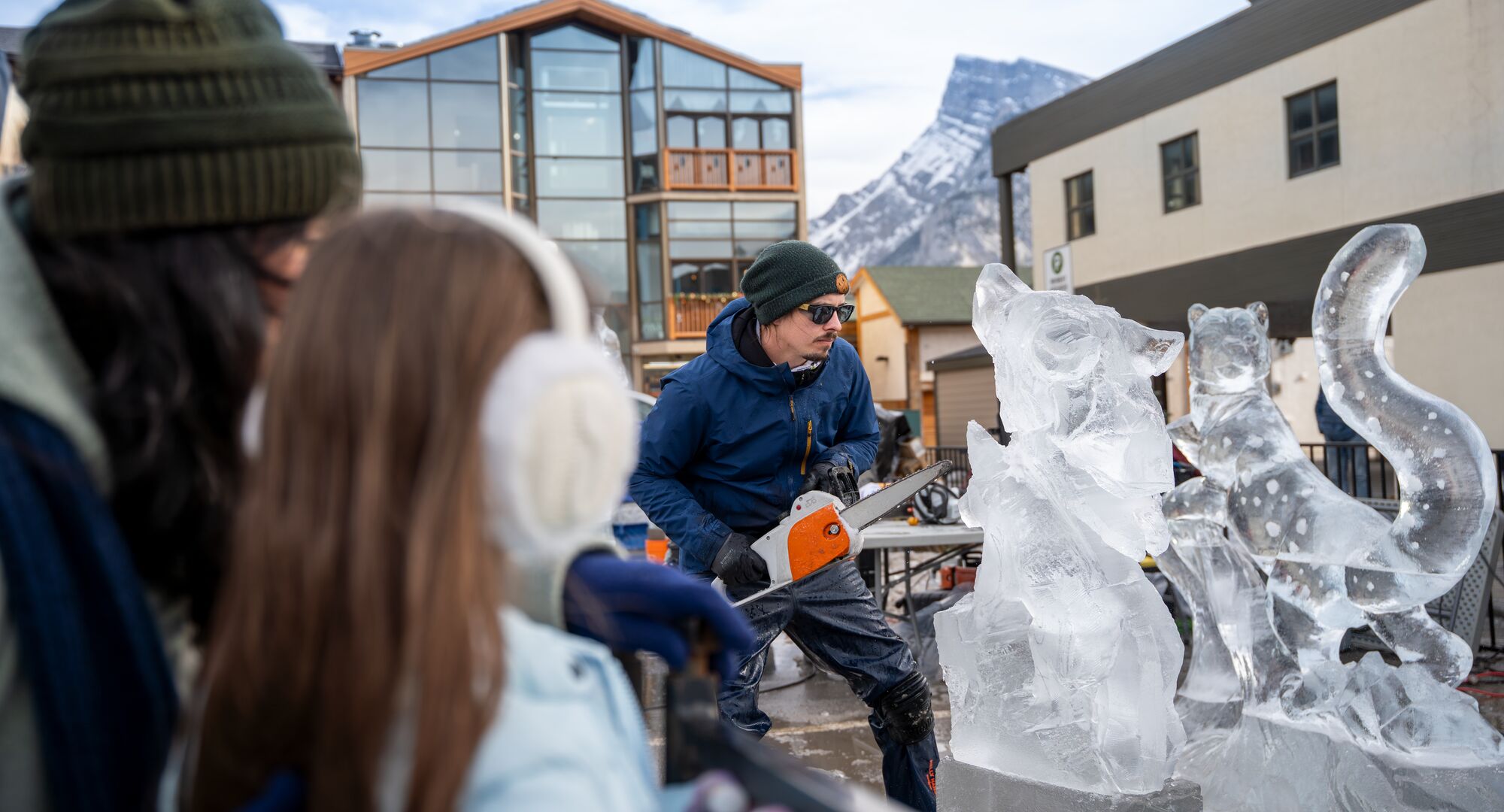 Two professional ice carvers during SnowDays in Banff and Lake Louise