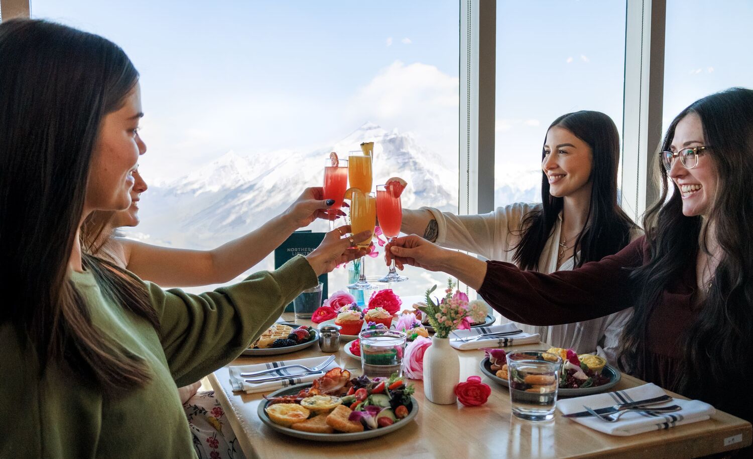 A group of friends at brunch at Sky Bistro in Banff National Park