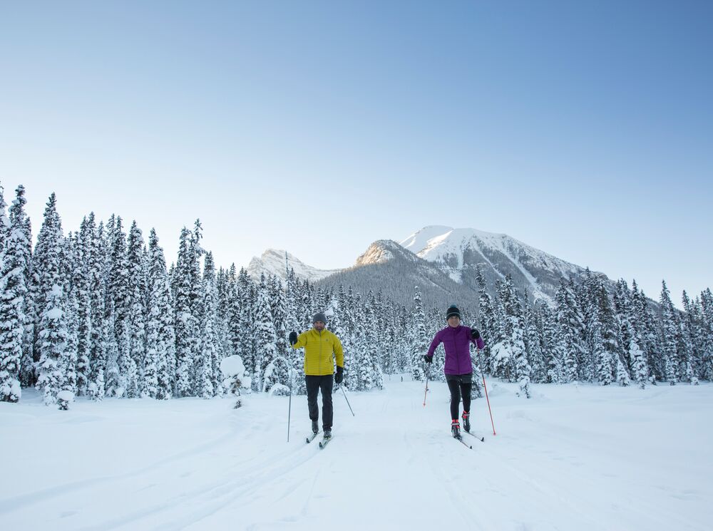 A couple cross country skiing in Banff National Park