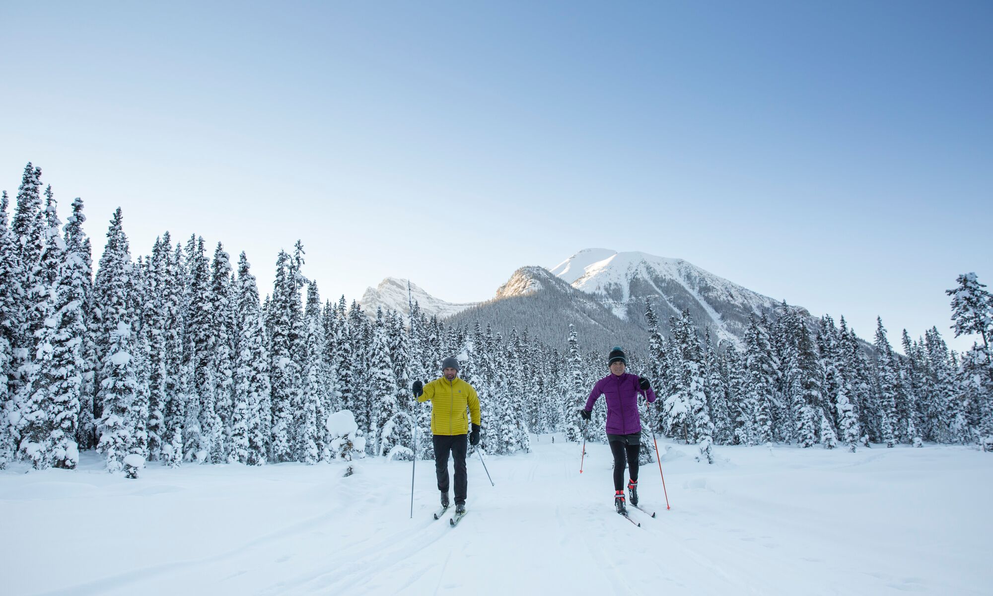 A couple cross country skiing in Banff National Park
