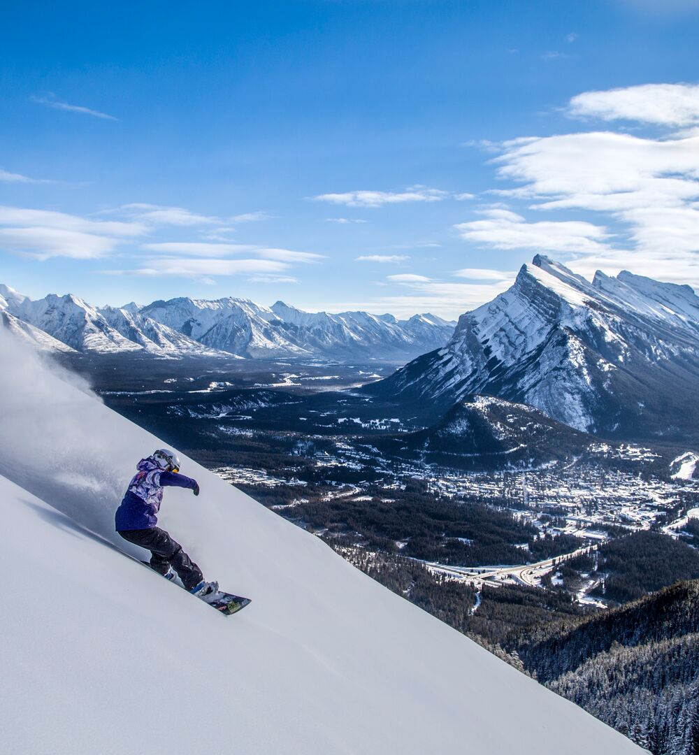 A person snowboarding at Mount Norquay in Banff National Park