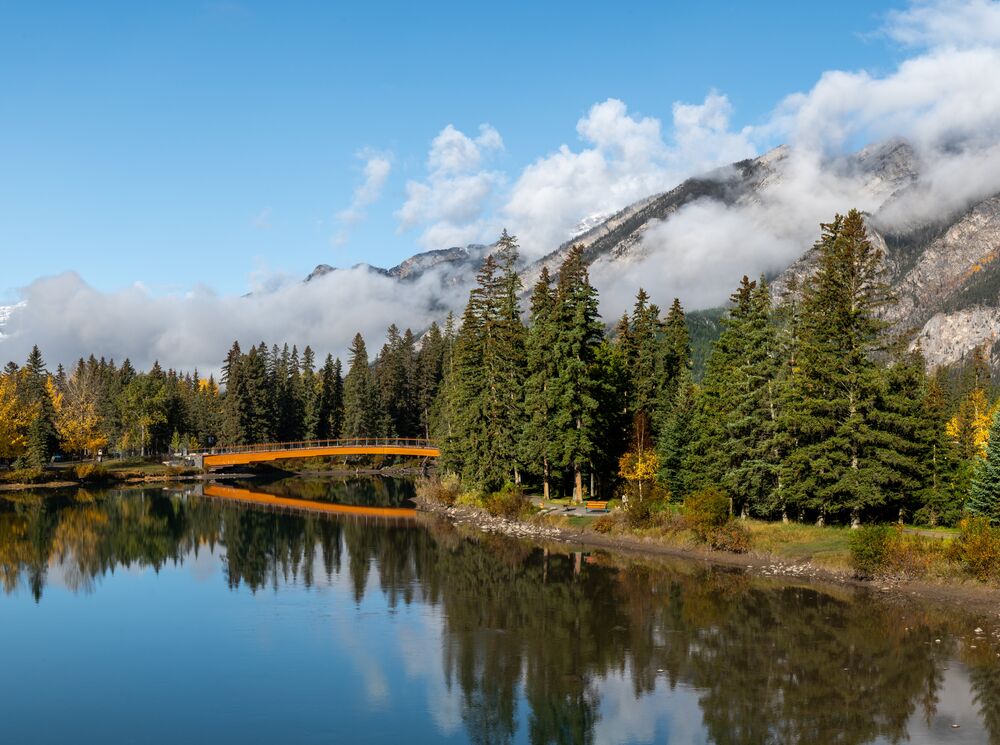 The Banff pedestrian bridge with Mount Norquay in Banff National Park 