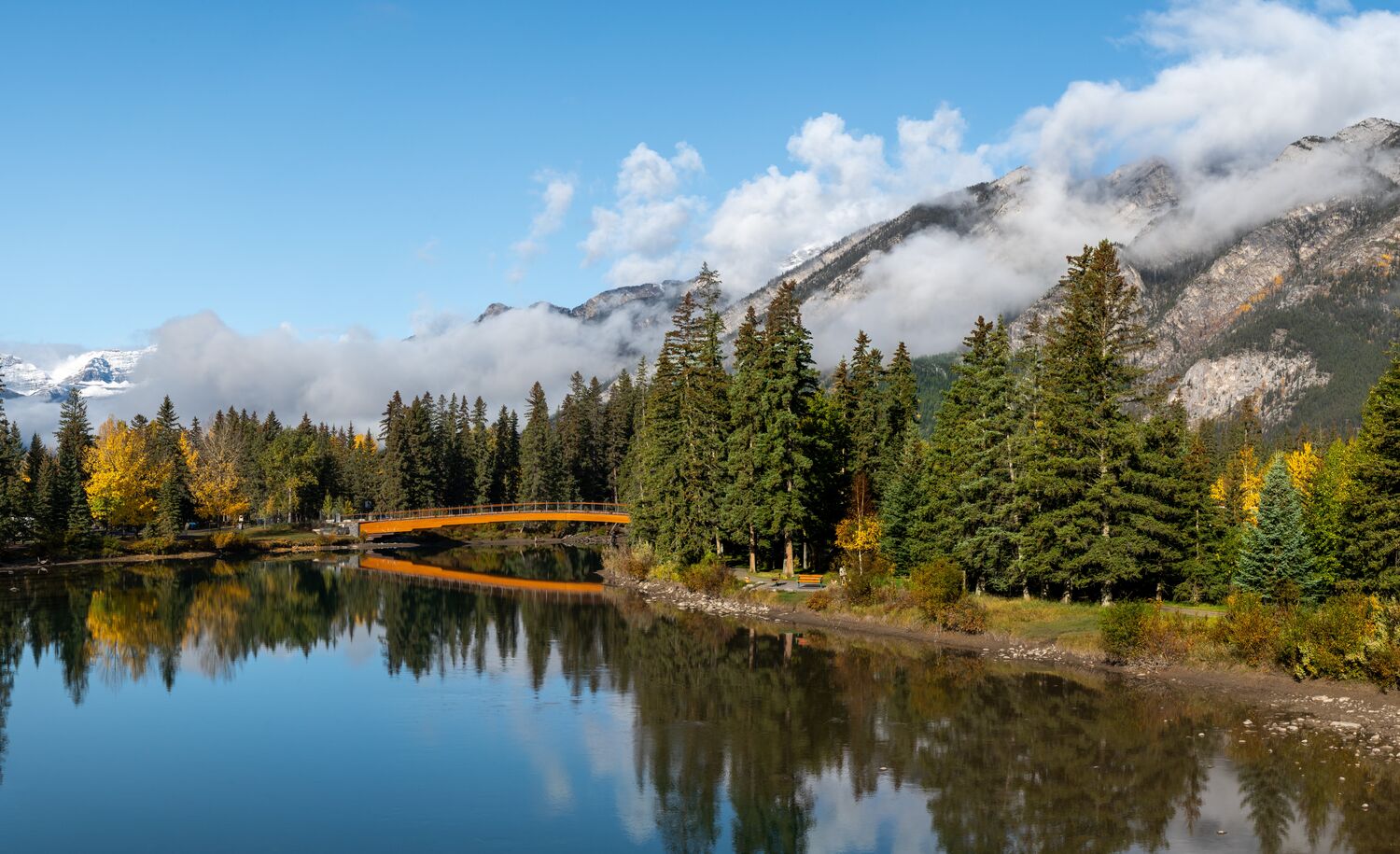 The Banff pedestrian bridge with Mount Norquay in Banff National Park 