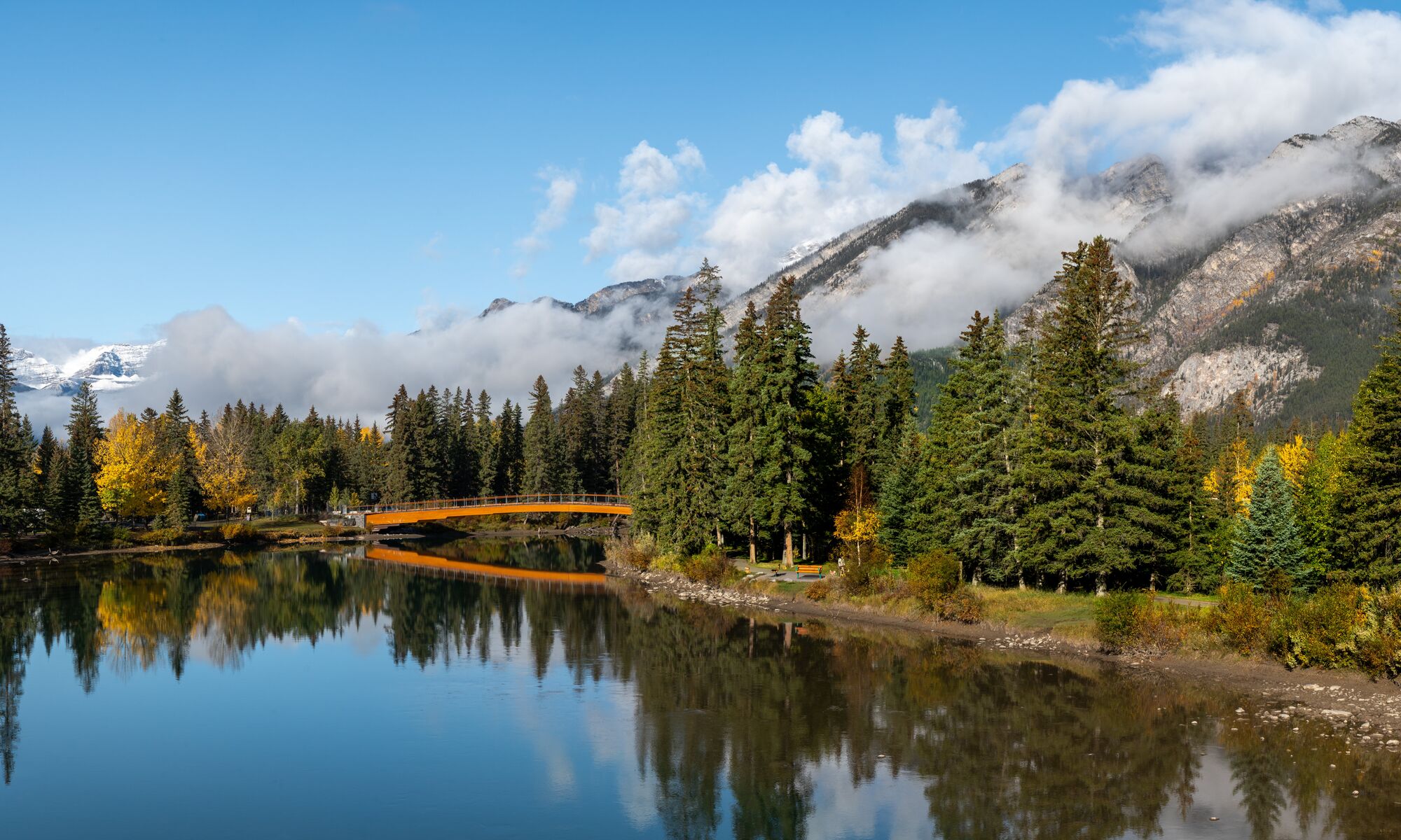 The Banff pedestrian bridge with Mount Norquay in Banff National Park 