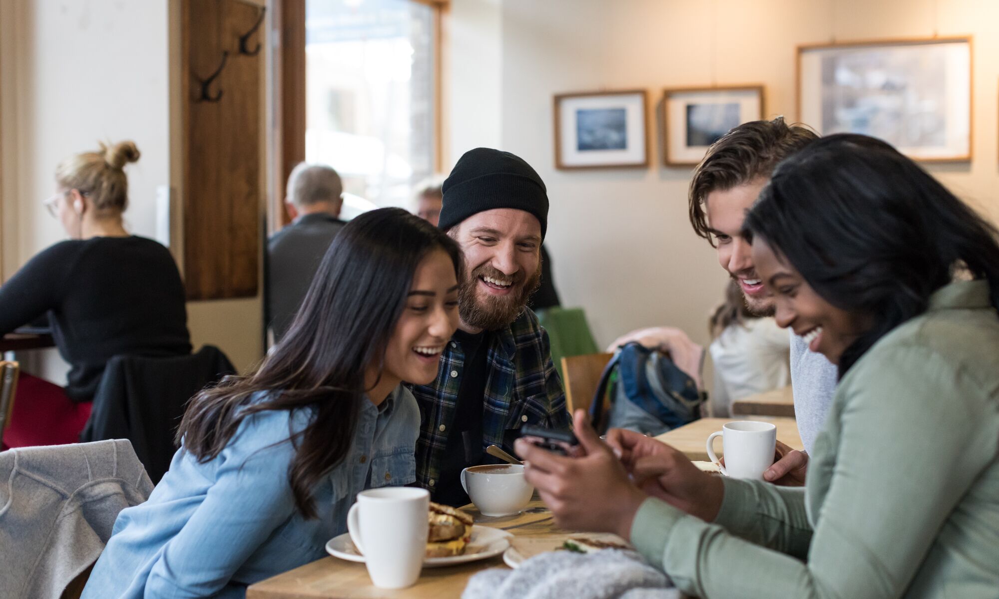 Friends enjoy a conversation at Wild Flour in Banff National Park.