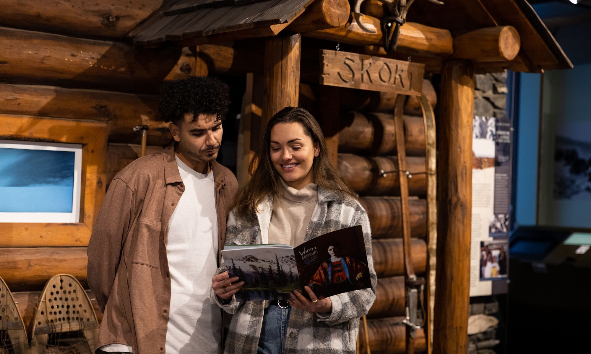 Two people inside a museum in Banff National Park