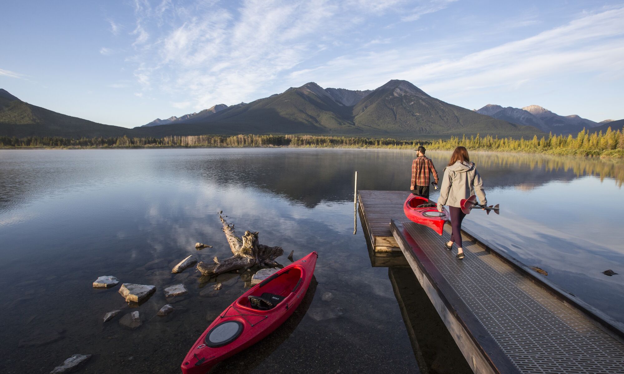 Two people kayaking at Vermillion Lakes in Banff National Park