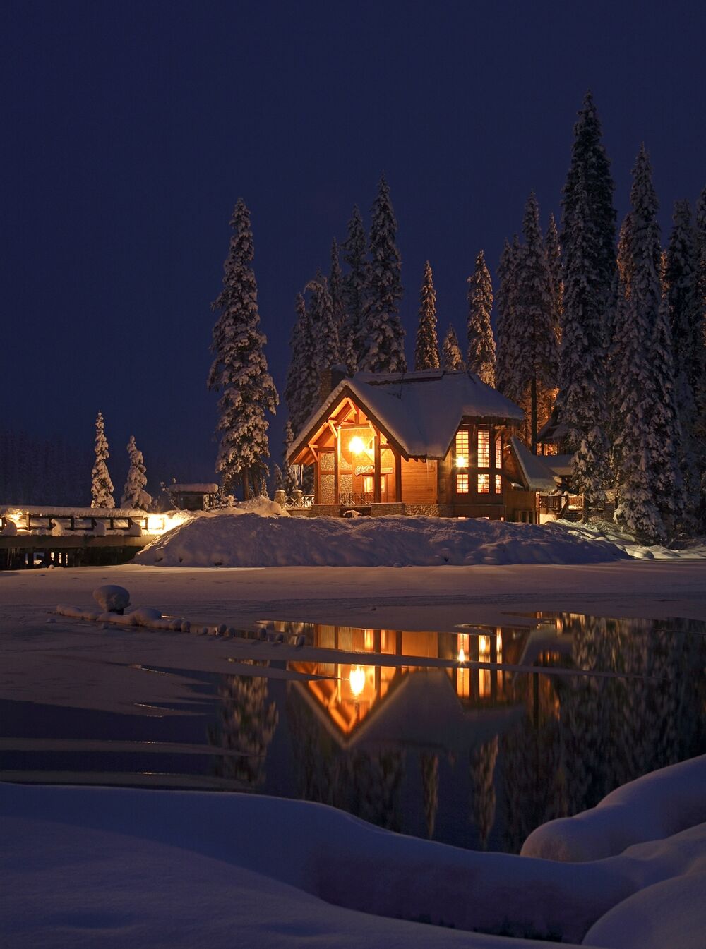 Emerald Lake Lodge at night in the winter in Yoho National Park near Banff National Park.
