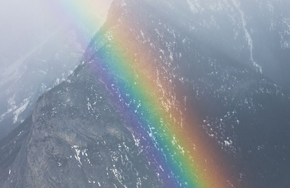 A rainbow in front of Mount Rundle in Banff National Park.