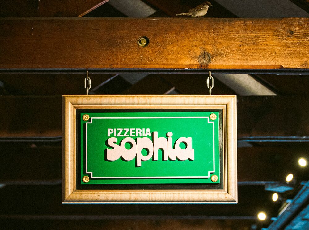 Pizzeria Sophia's sign in Banff.