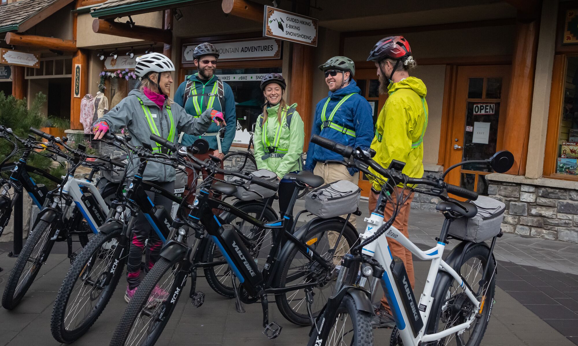 A group waits for a guided e-bike tour to start in Banff National Park.