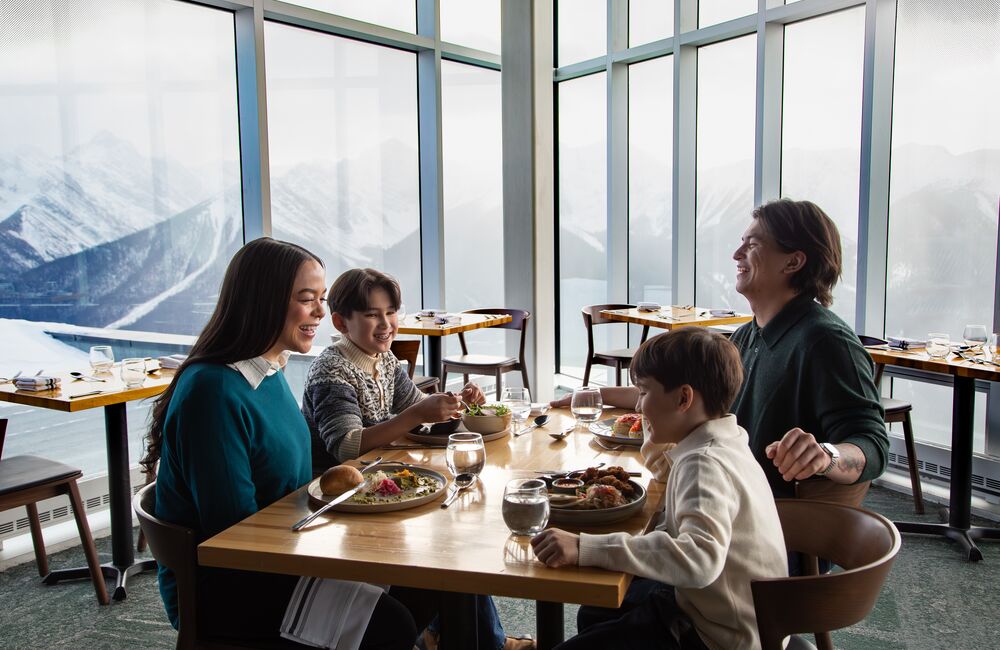A family enjoying a meal at the Sky Bistro at the top of the Banff Gondola