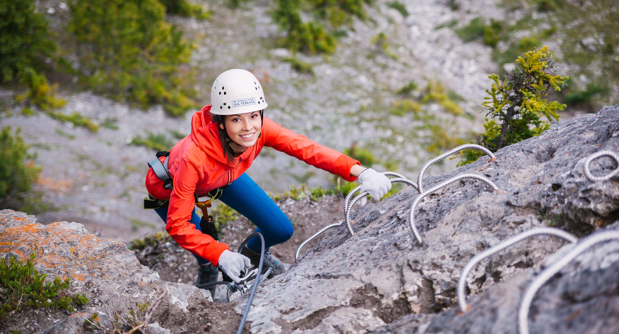 Person climbing the Mt. Norquay Via Ferrata in Banff National Park