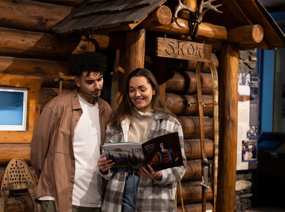 Friends explore the Whyte Museum in Banff National Park.