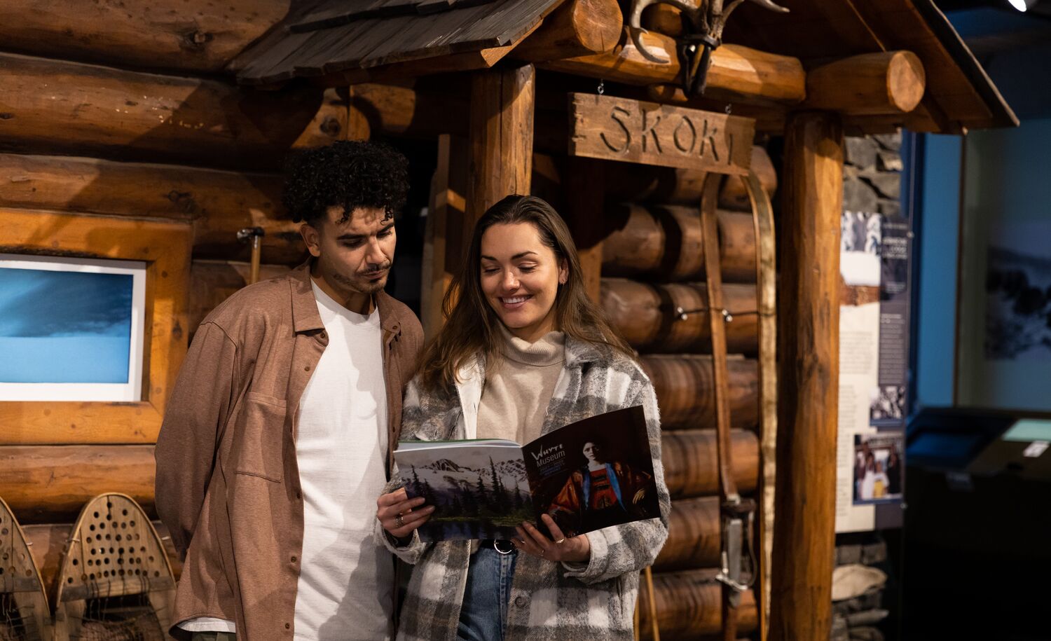 Friends explore the Whyte Museum in Banff National Park.