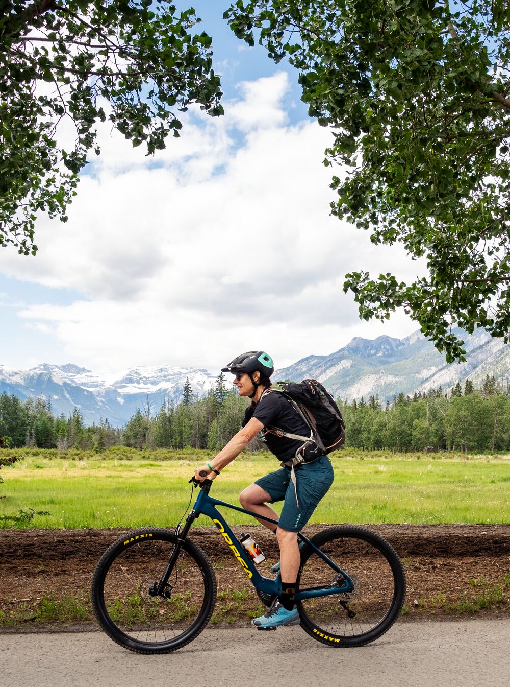 Two people biking the golf course loop in Banff National Park