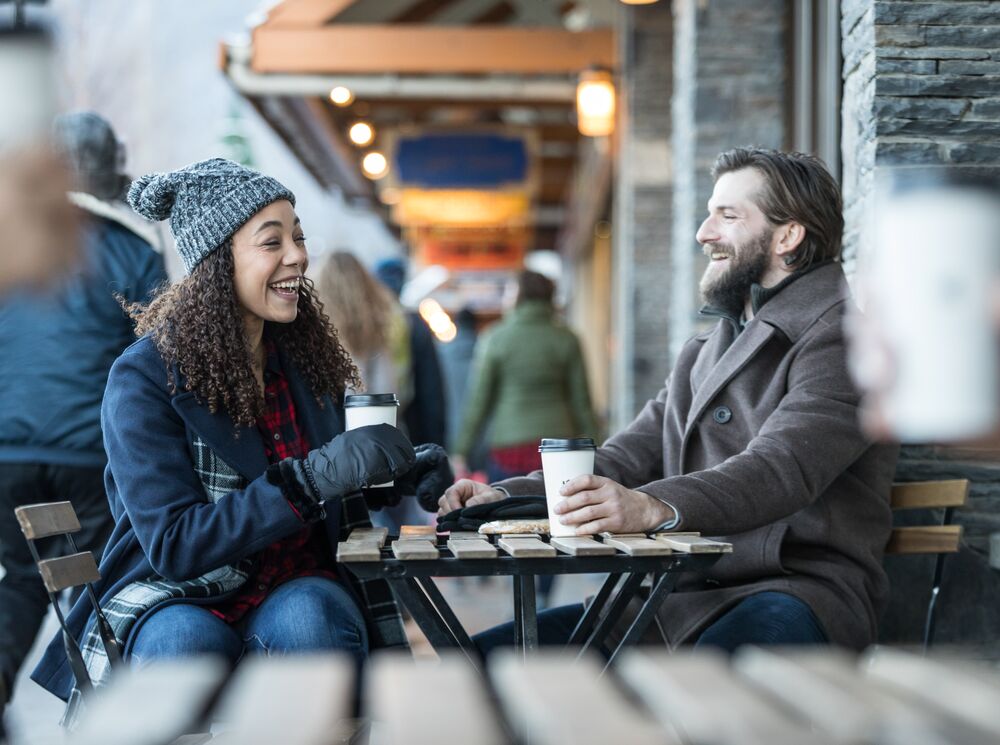 The sweet couple shares their happiness while drinking coffee at Evelyn's Coffee Bar.