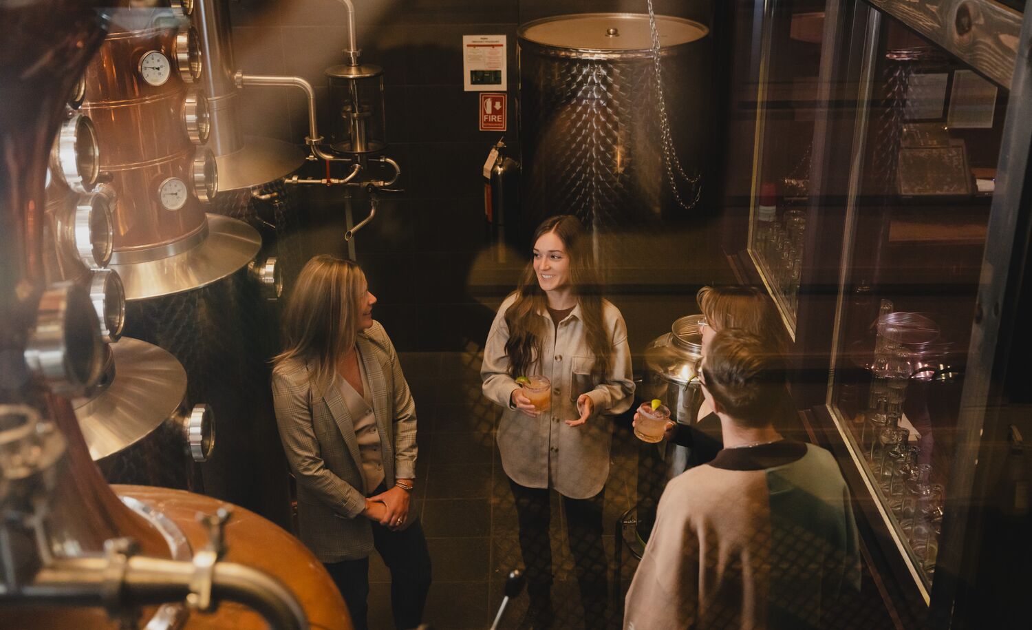 Four people take the PARK Distillery on-site tour in Banff.