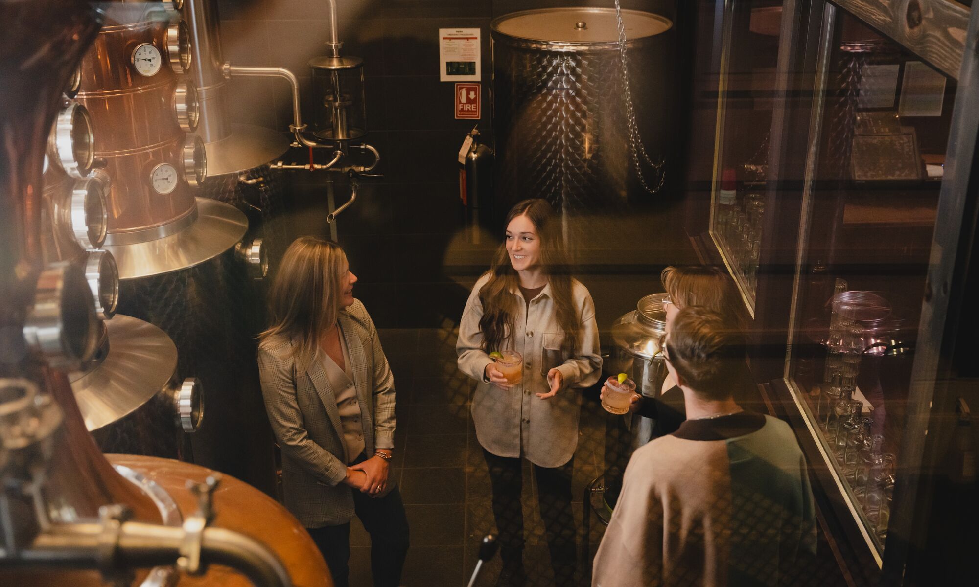 Four people take the PARK Distillery on-site tour in Banff.