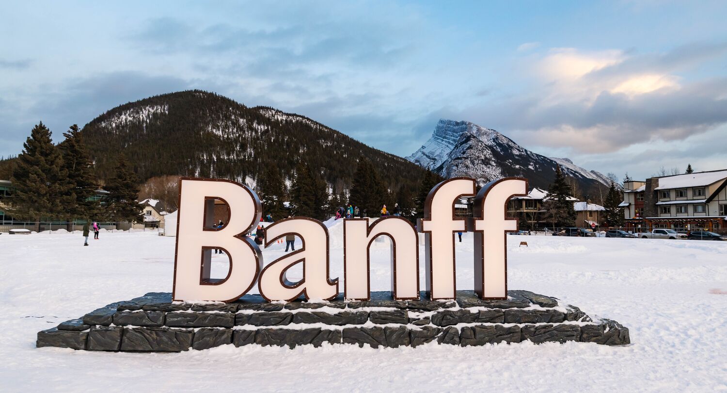 An image of Banff's Town signage in a winter day.