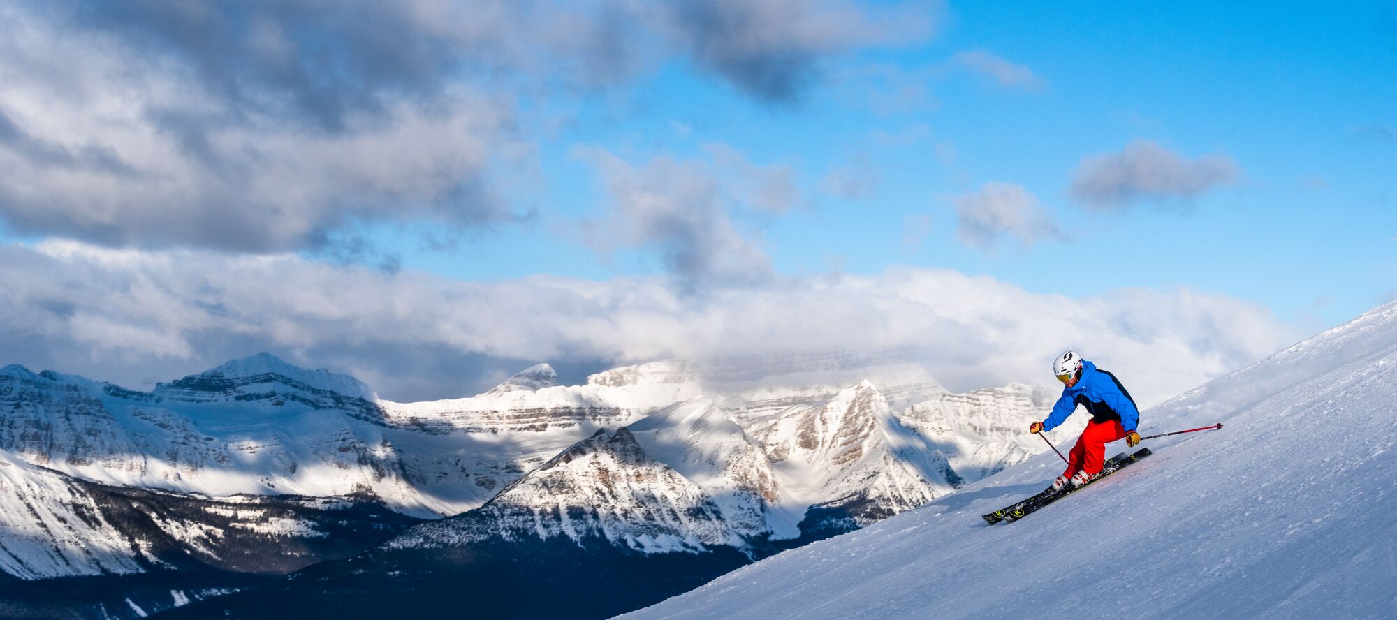 A skier skis down the slopes in Lake Louise Ski Resort in Banff National Park.