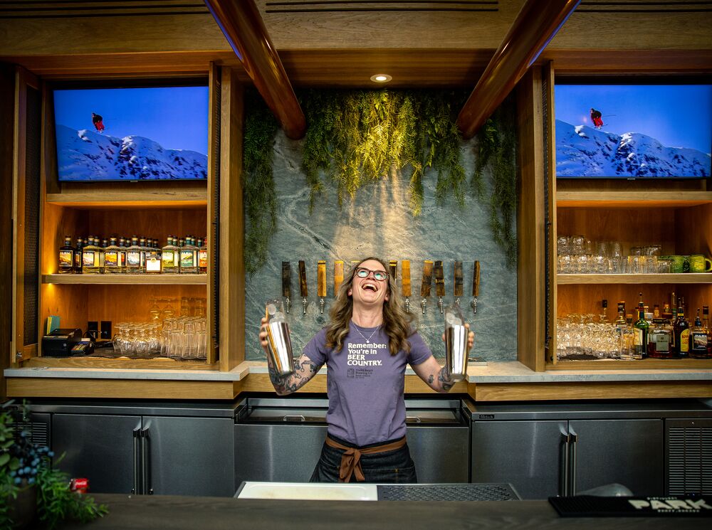 A bartender makes cocktails at 3 Bears on Bear Street in Banff National Park.