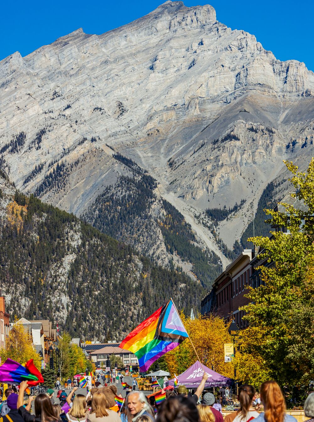 A pride flag flies on Banff Ave during the annual Pride Parade in October