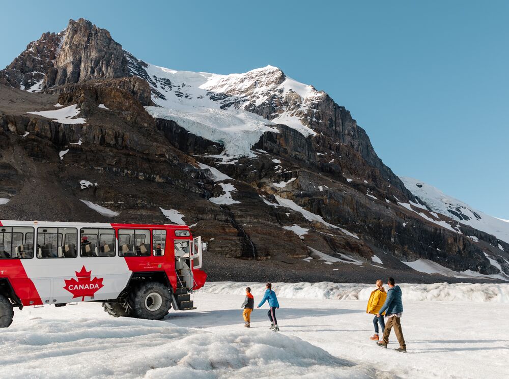 A family of four on the Columbia Icefield Adventure on the Icefields Parkway