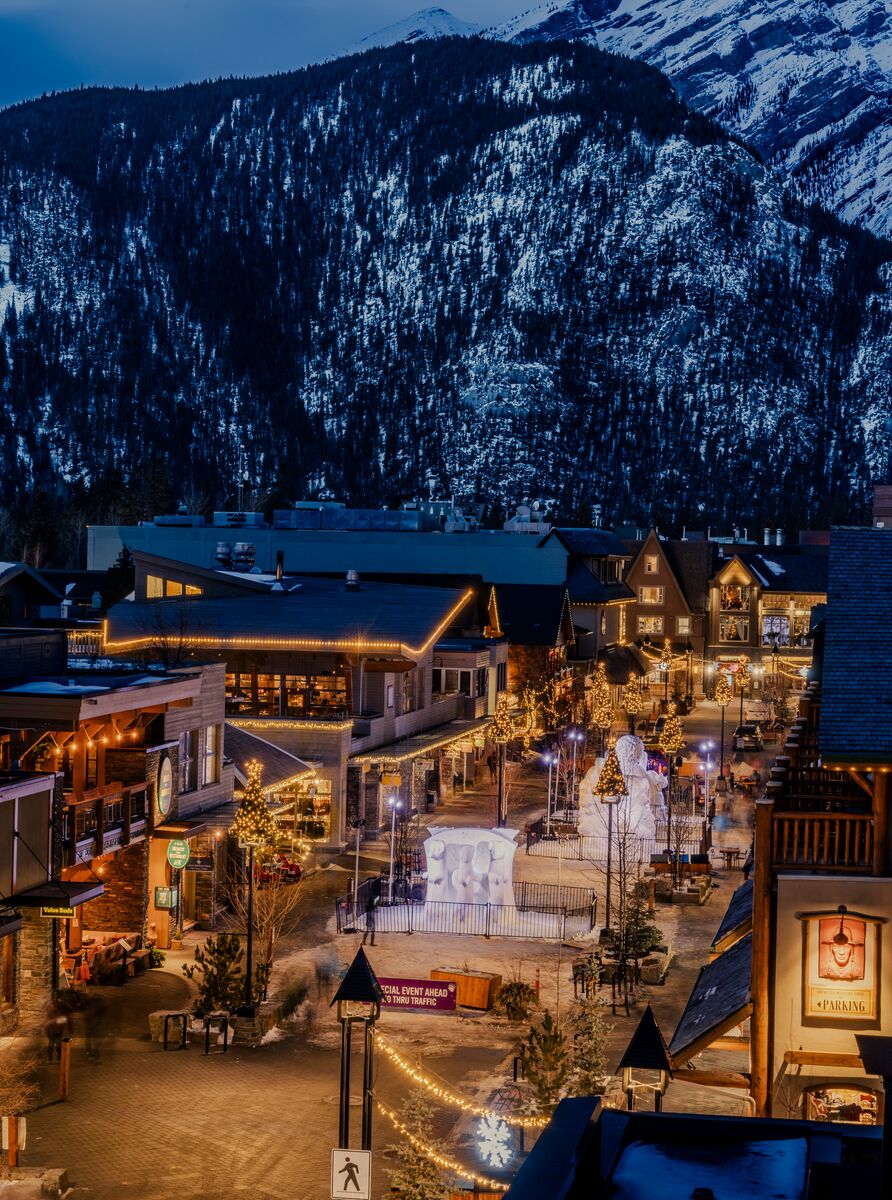 Snow sculptures on Bear Street as seen from above at night during Snow Days.