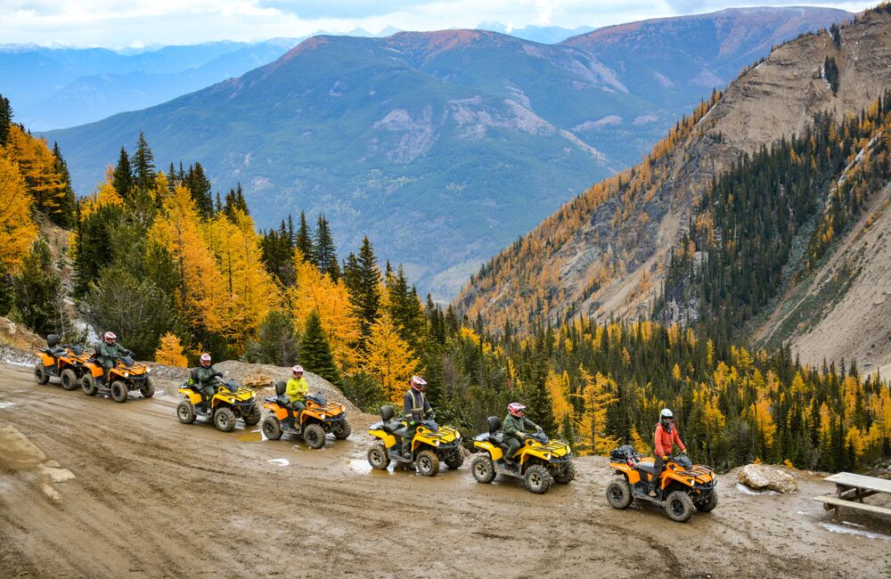 Group of people on an exciting ATV tour in the mountains with Toby Creek Adventures