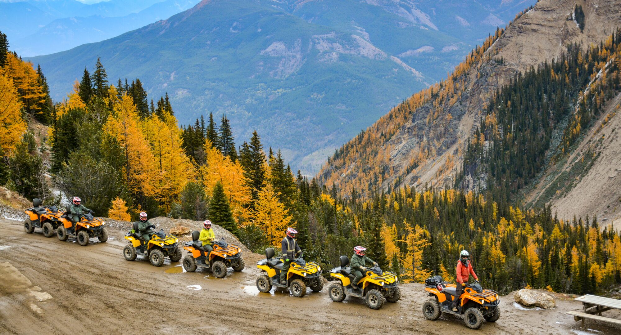 Group of people on an exciting ATV tour in the mountains with Toby Creek Adventures