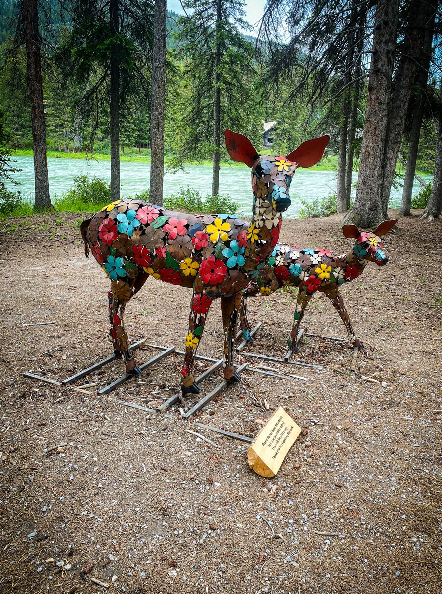 A statue of deer on the Art in Nature Trail in Banff.