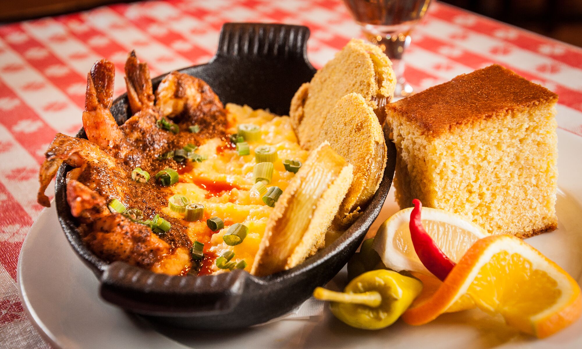 A shrimp dish on a checkered table cloth at Tooloulou's in Banff.