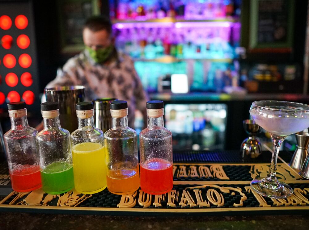 Colourful alcohol bottles on a counter at Nourish.