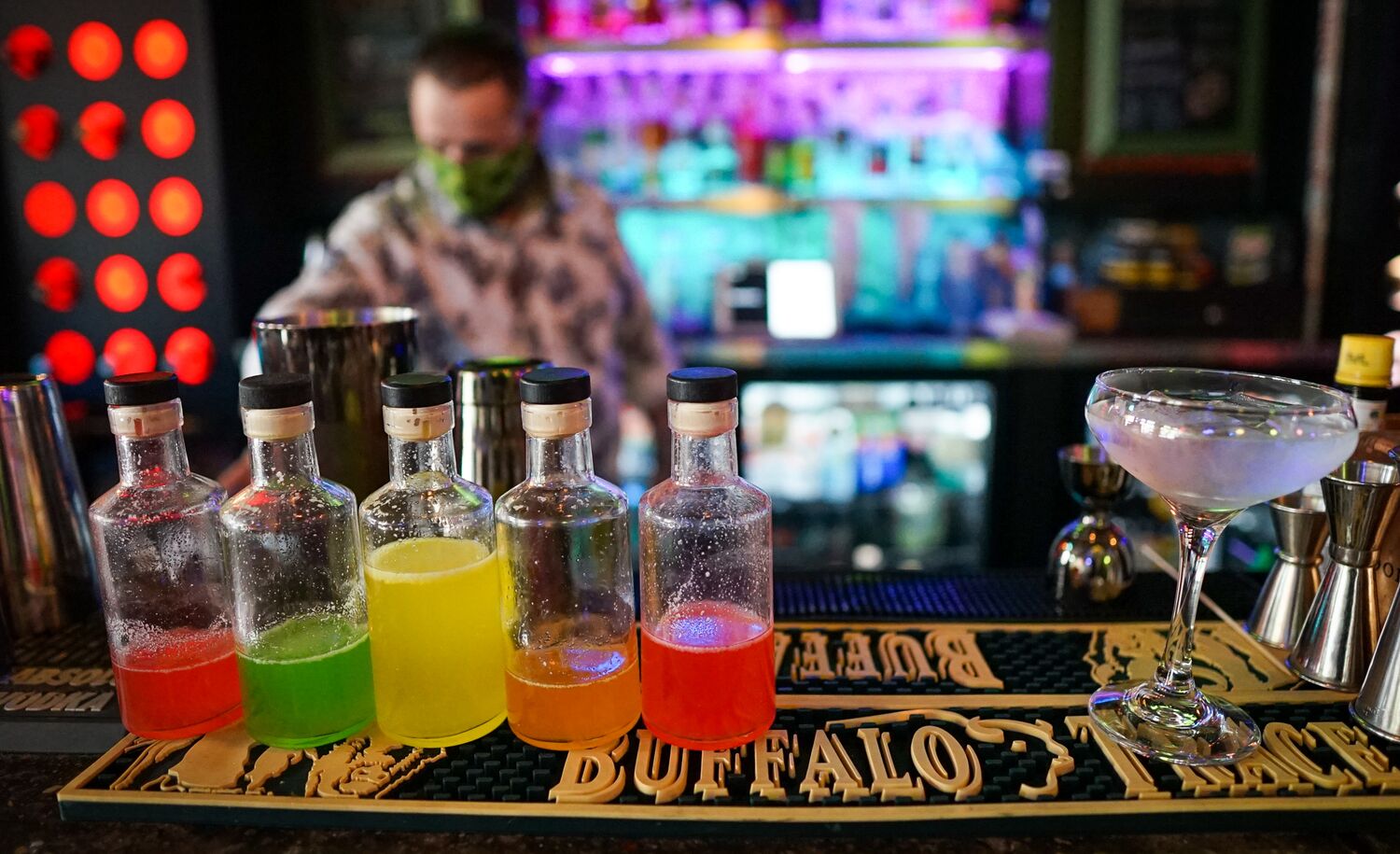 Colourful alcohol bottles on a counter at Nourish.