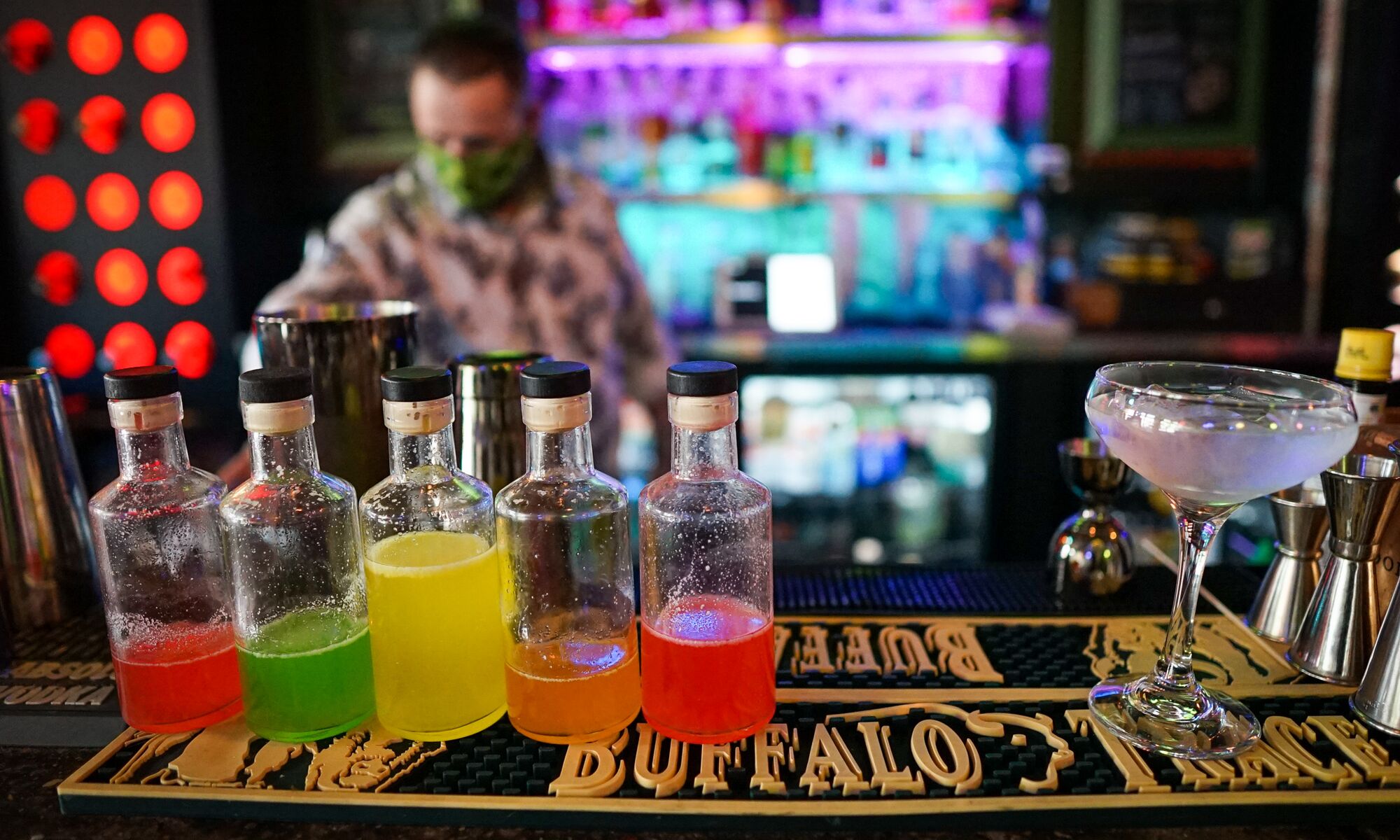 Colourful alcohol bottles on a counter at Nourish.