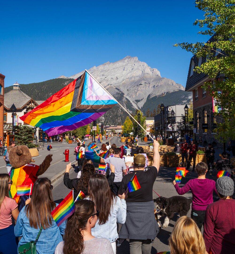 People celebrating Banff Pride on Banff Ave.