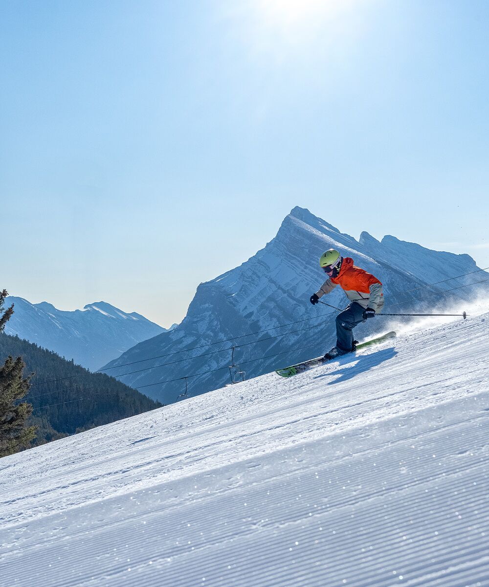 Two people skiing at Mt. Norquay in Banff National Park.